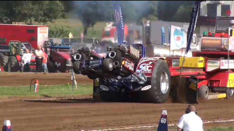 View This Twin Tank Engined Pulling Tractor Make A Full Pull With The Wheels Up Like A Boss